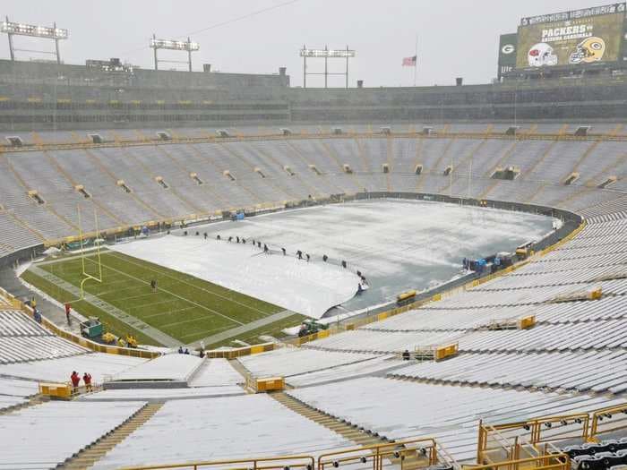 The Packers are offering $12 an hour for 700 shovelers to help clear snow before their huge playoff game