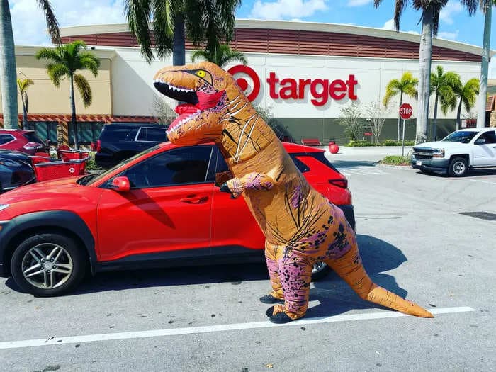 'There's a T-Rex in Walmart!' People are now wearing dinosaur suits to go grocery shopping, and people on Twitter are thanking them for it