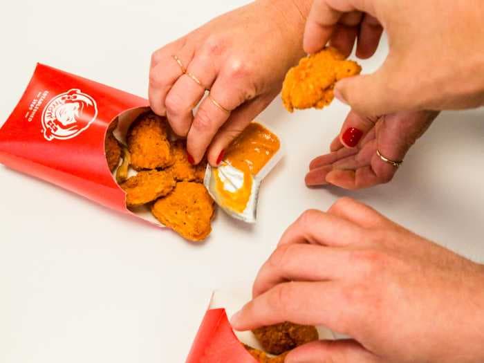 Wendy's slams McDonald's new spicy nuggets on Twitter, saying its rival 'must have scraped up all of BKs leftovers'