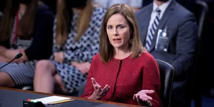 Amy Coney Barrett apologizes after being called out by a Democratic senator for using the 'offensive and outdated' term 'sexual preference' to refer to LGBTQ people
