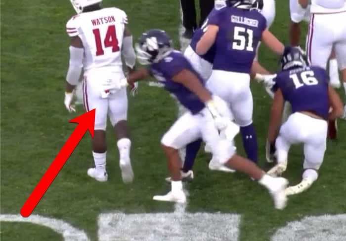 Northwestern football player seen snatching hand towels from unsuspecting Wisconsin players in the middle of the game