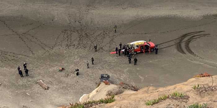 Woman survives after her car plunged 120 feet off a cliff and landed upside-down on a California beach