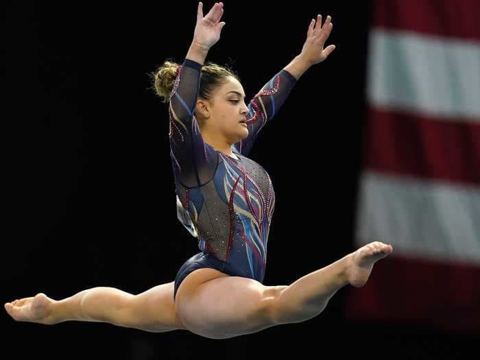 Laurie Hernandez completed a 'Hamilton'-inspired floor routine in a Captain Marvel leotard during her first gymnastics meet in 5 years