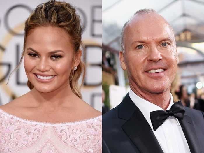 Chrissy Teigen says she took a glass of champagne out of Michael Keaton's hands at a party because she thought he was a server