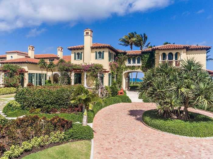 Inside Larry Ellison's new $80 million Palm Beach mansion, which sits in a high-security gated community and has 520 feet of ocean frontage