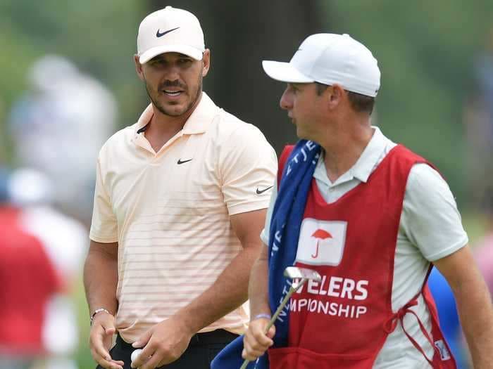 Brooks Koepka continues golf's biggest rivalry by trolling Bryson DeChambeau after sudden split with caddie