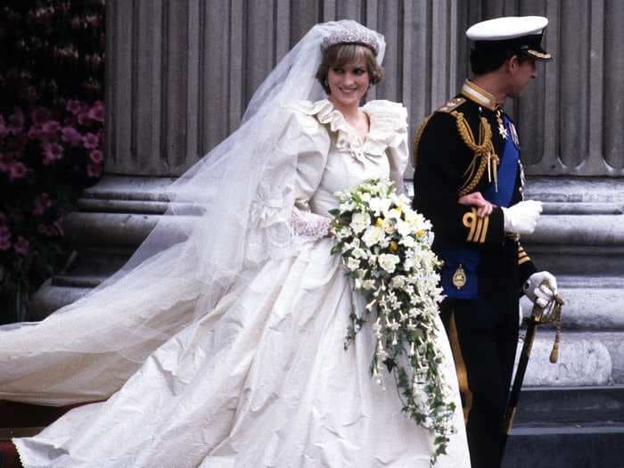 A royal photographer said Diana and Charles' wedding was a 'very happy occasion' for everyone but the princess
