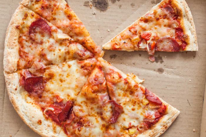 An Ohio high-school athlete is suing his coaches, accusing them of forcing him to eat pizza with pepperoni grease as a punishment for missing an off-season workout