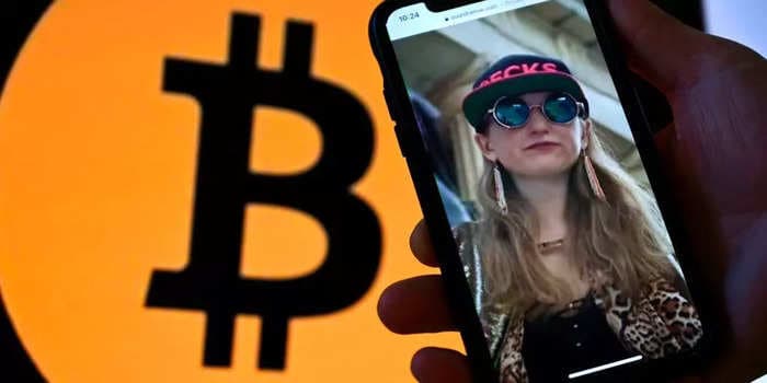 Agents had to 'wrest' a phone out of the hands of one of the accused bitcoin launderers as she repeatedly tried to lock the device