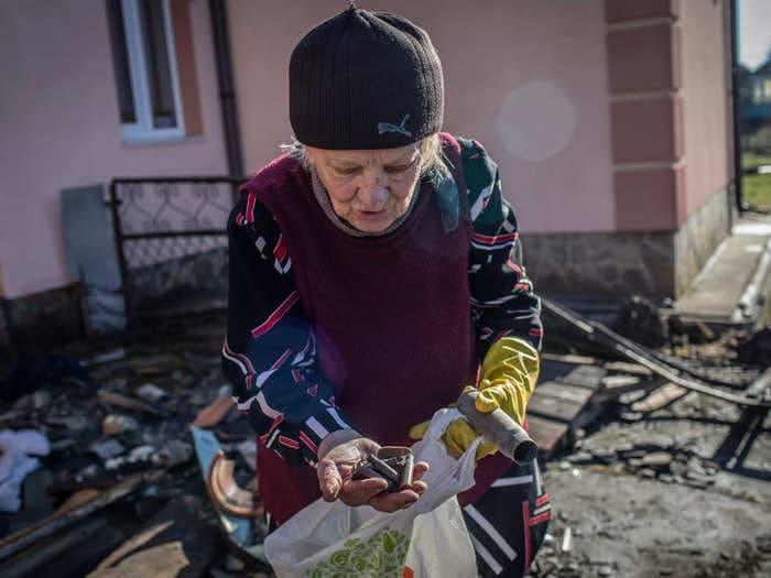 Photos show graffitied walls and destroyed Ukrainian homes in the aftermath of Russian looting in Bucha