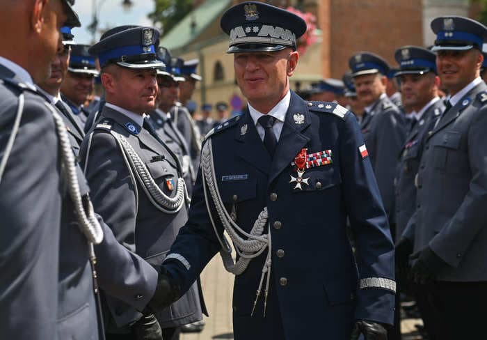Poland's top police chief was injured after a gift he received from a Ukrainian official exploded, Polish authorities say