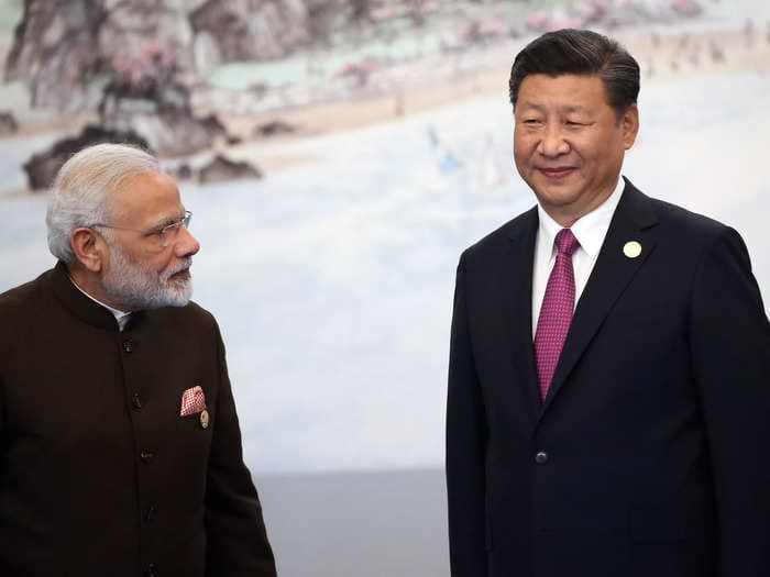 Adani's crisis is casting a cloud over India — and it could benefit China, which is just reopening after 3 years of COVID isolation