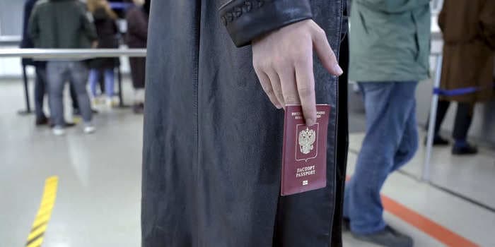 Russia is confiscating passports from its elites, fearing they will defect over its invasion of Ukraine, report says