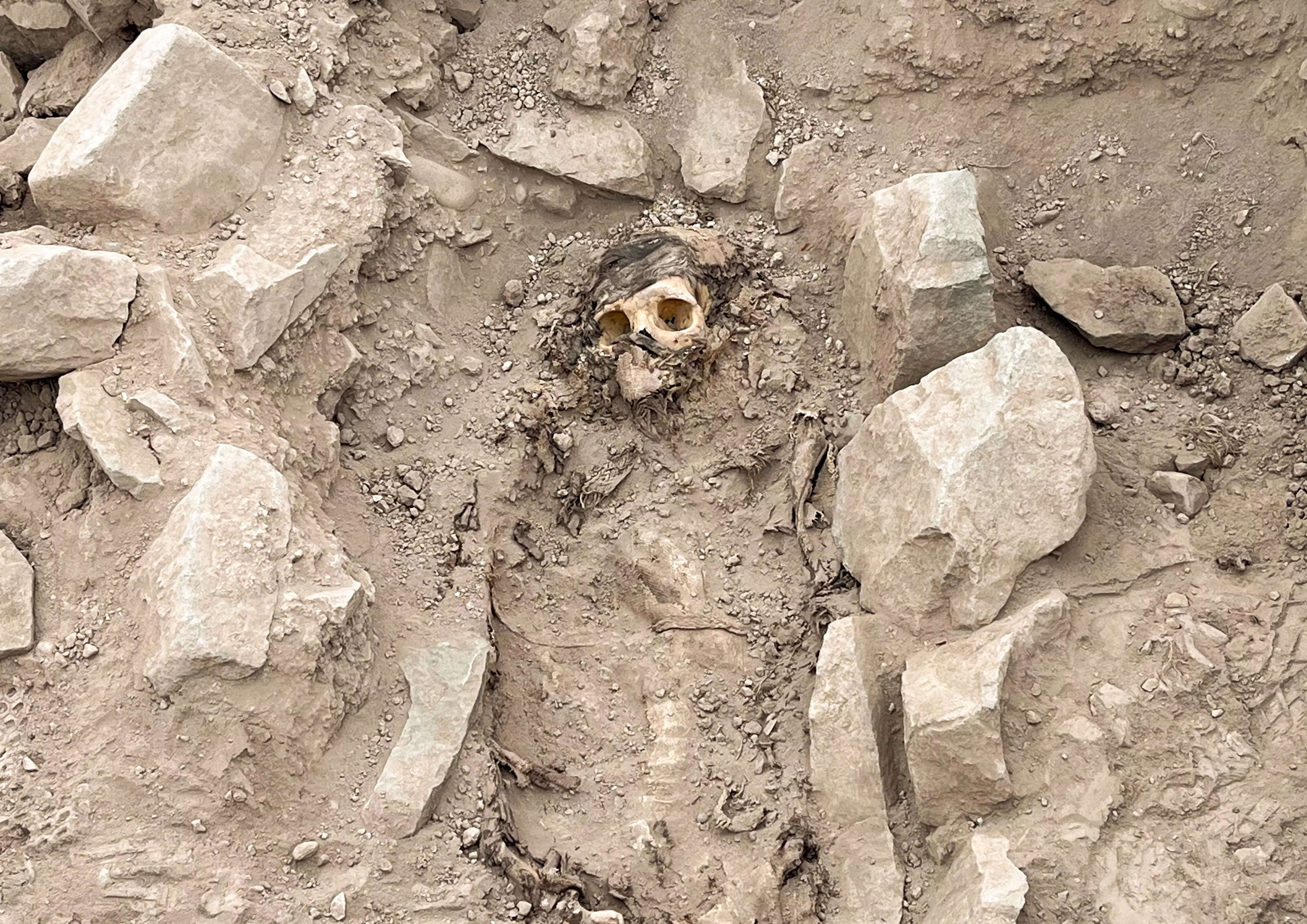 3000 year old peruvian mummy found under trash dump may have been left as a sacrifice