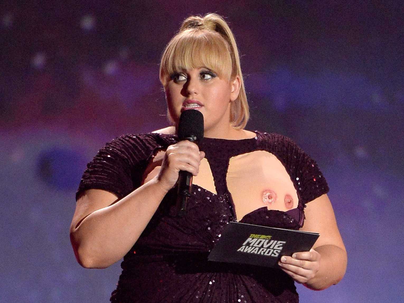 Later, while discussing body image, Rebel Wilson pulled down half her dress...