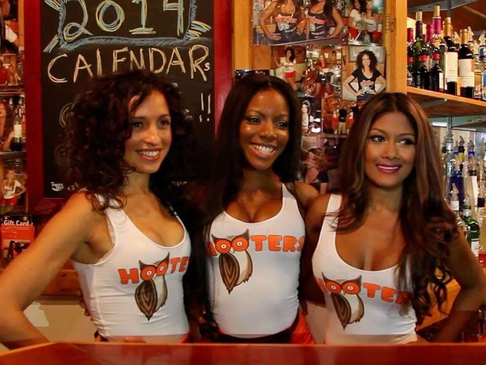 We talked to some of the famous Hooters girls from the chain's Manhatt...