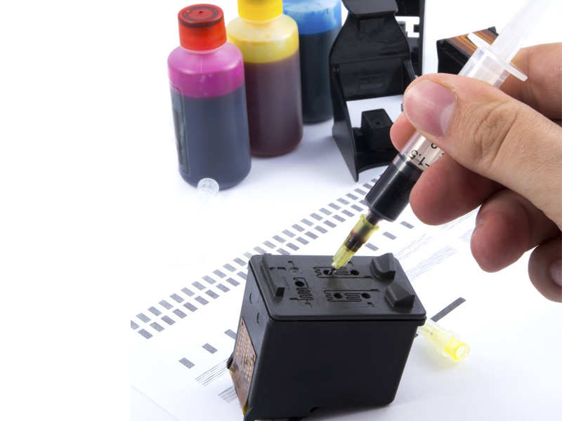 Ink Cartridge being refilled