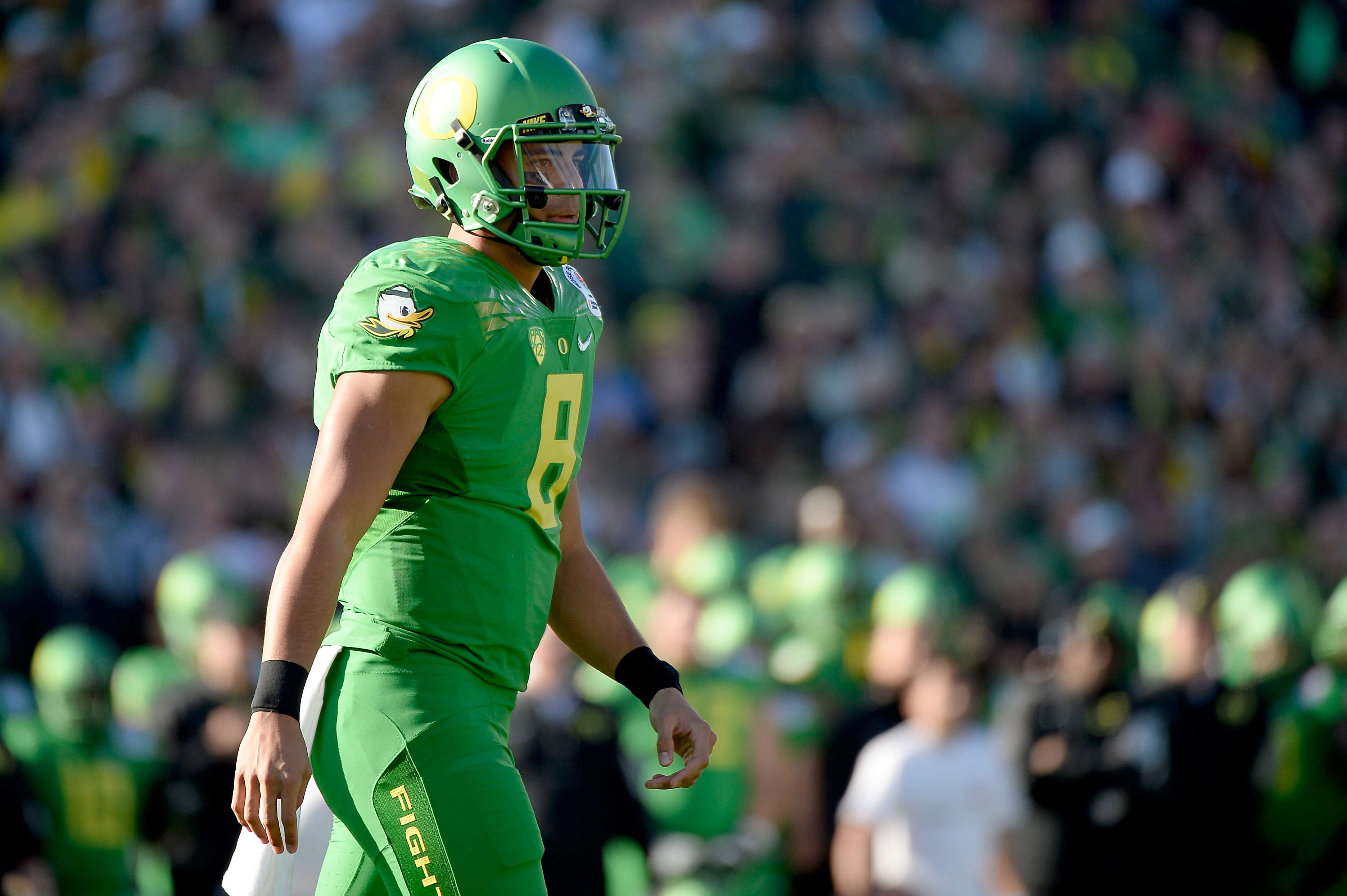 PHOTOS: How Oregon's Infamous Football Uniforms Went From Classic to Crazy