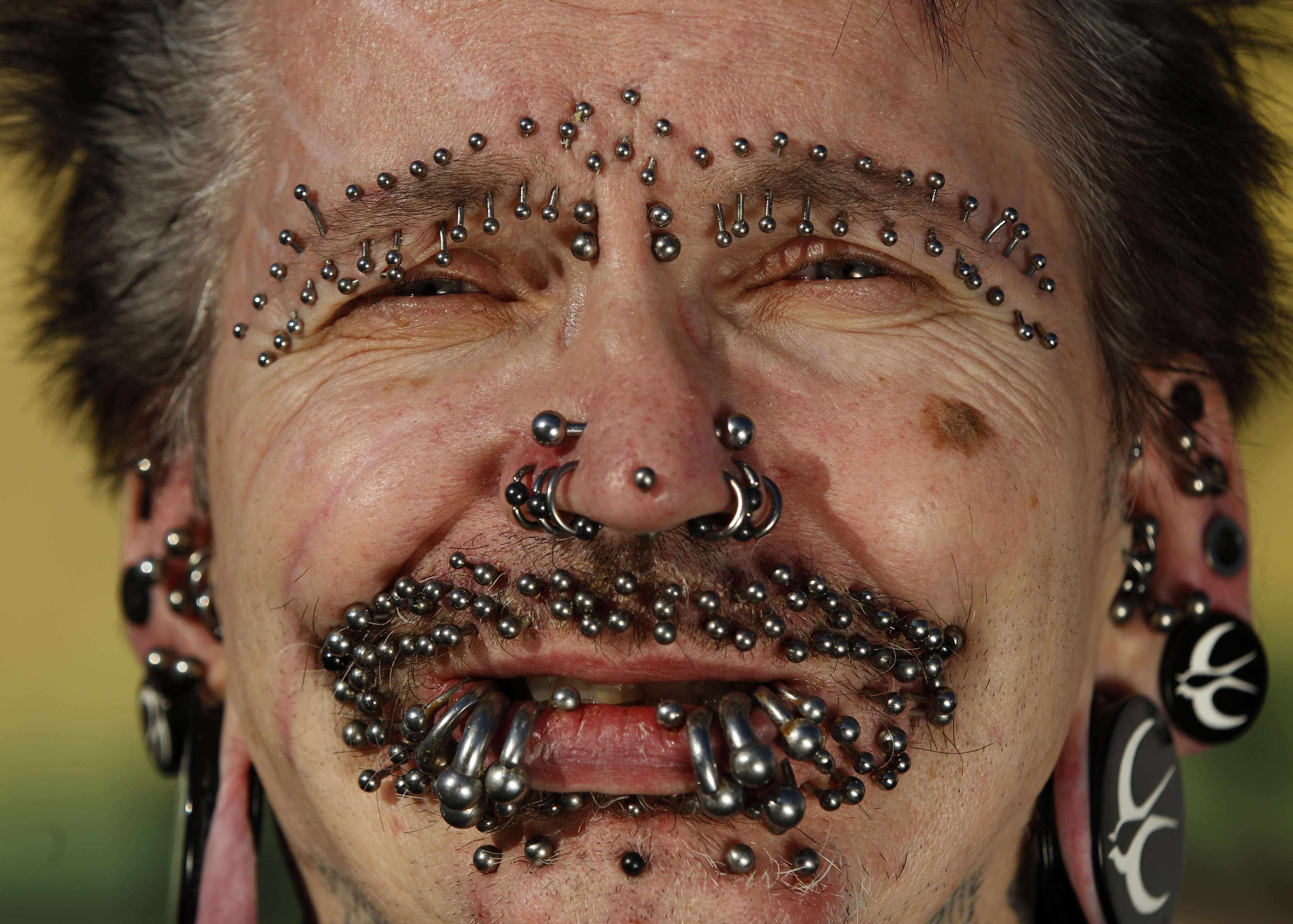 Guinness World Record holder for the 'Most Pierced Man', Rolf Buc...