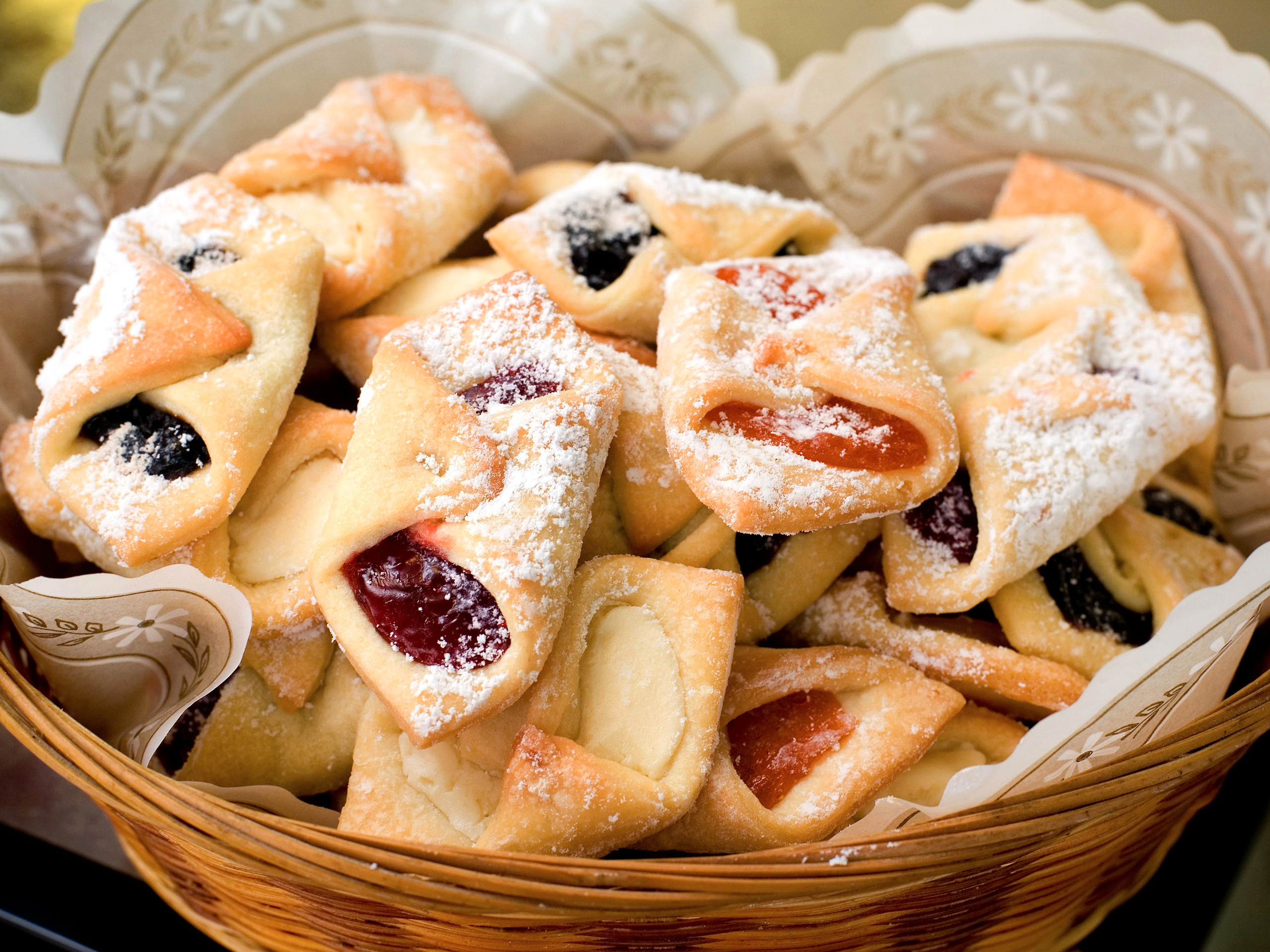 POLAND: Kolaczki are jam-filled holiday cookies that are ...