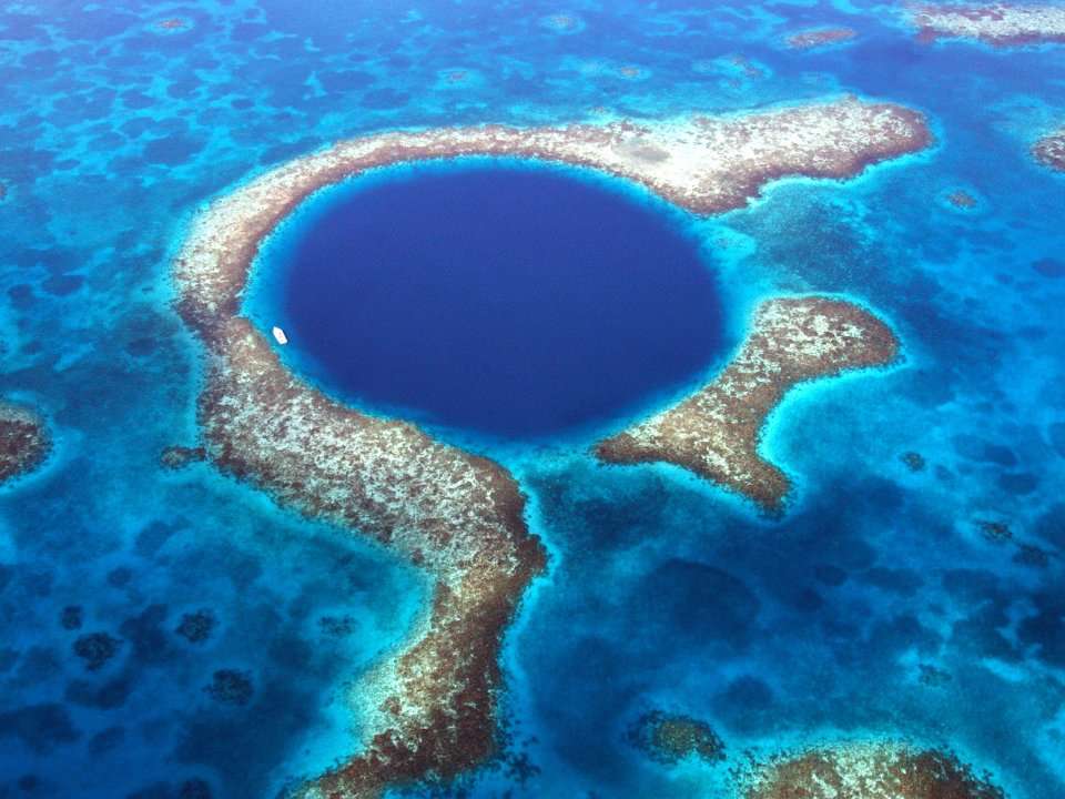skydiving blue hole belize cost