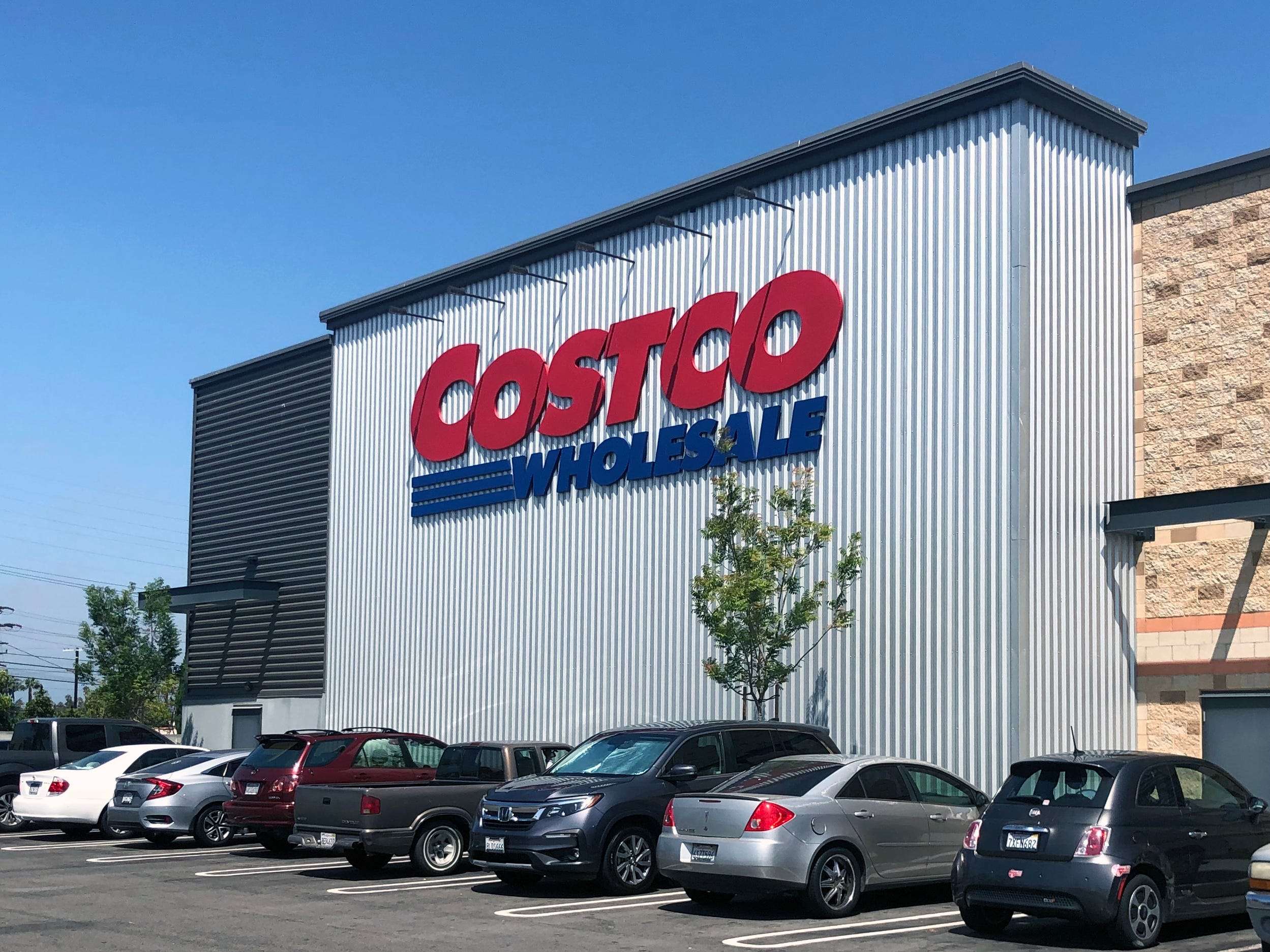 Costco will require all shoppers to wear masks and will return to ...