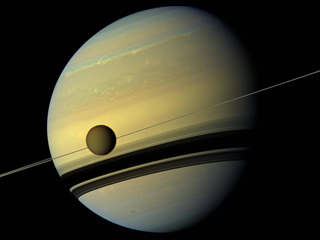 As Saturn's iconic rings disappear, it's on the verge of losing its largest  moon as well — at a rate that's 100 times faster than originally  anticipated | Business Insider India