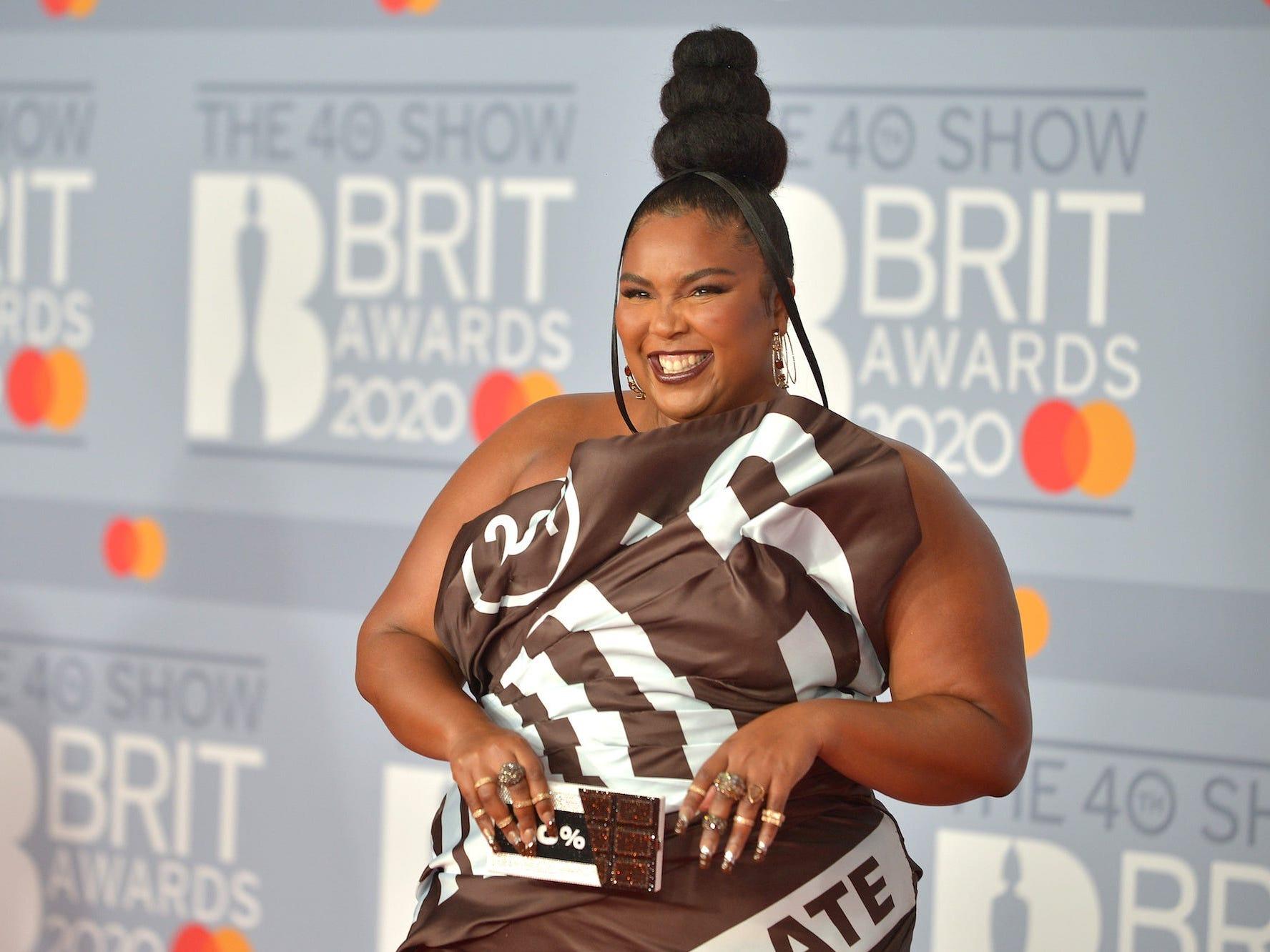 Lizzo shared a video of herself dancing in a sparkly see-through top and  high-waisted underwear
