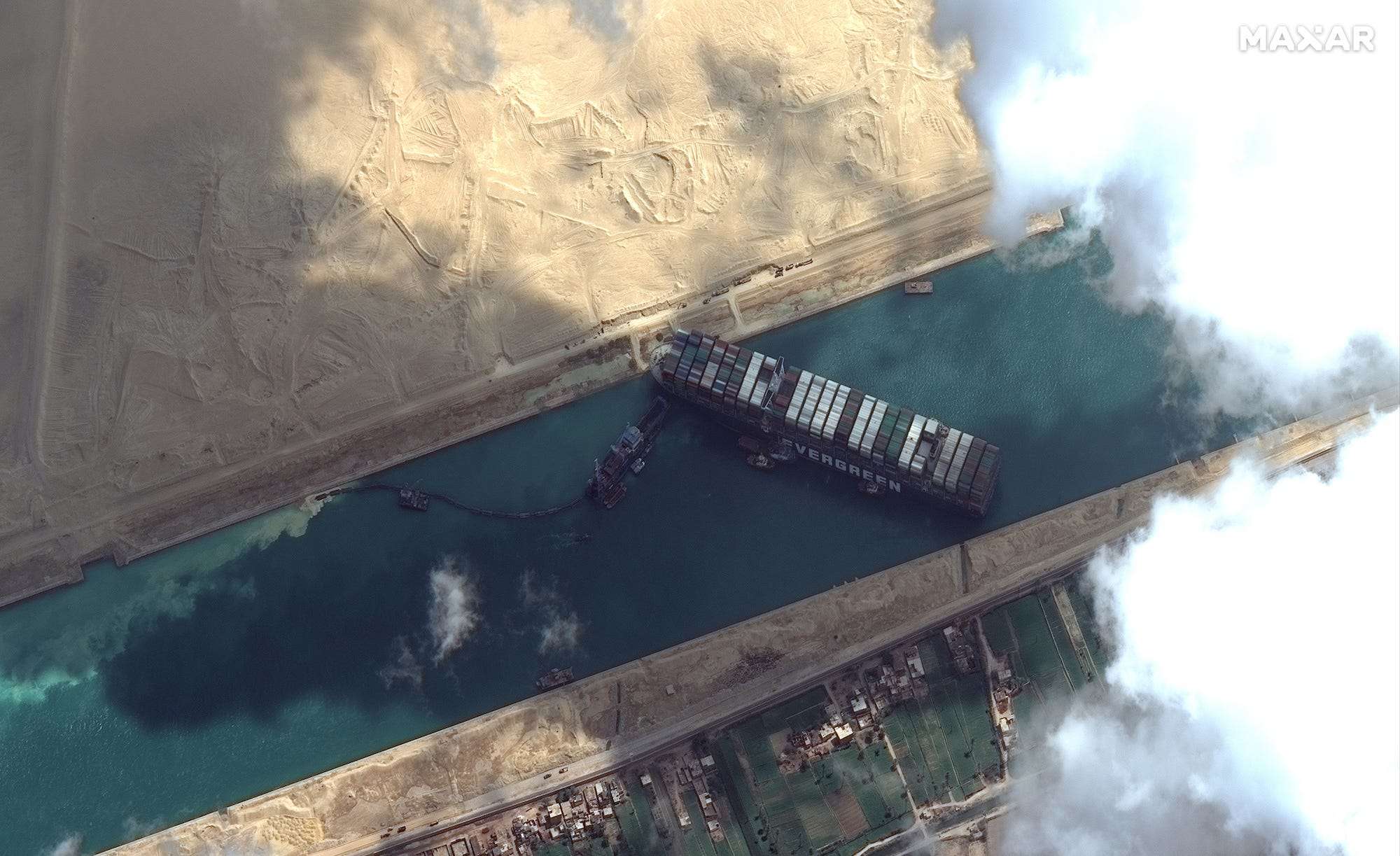 Satellite images show the massive cargo ship still stuck in the Suez