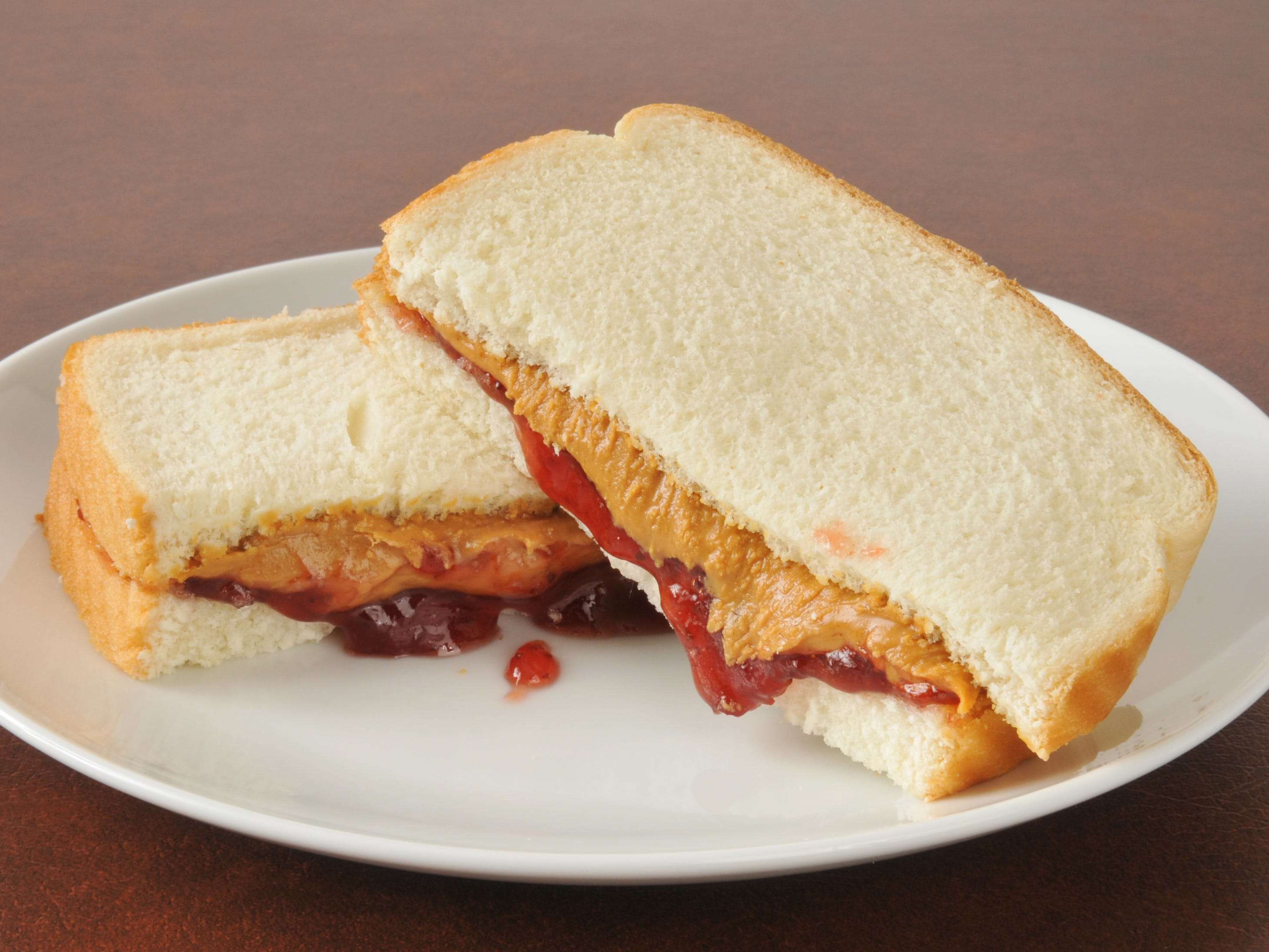 The best way to make a peanut butter and jelly sandwich, according to ...