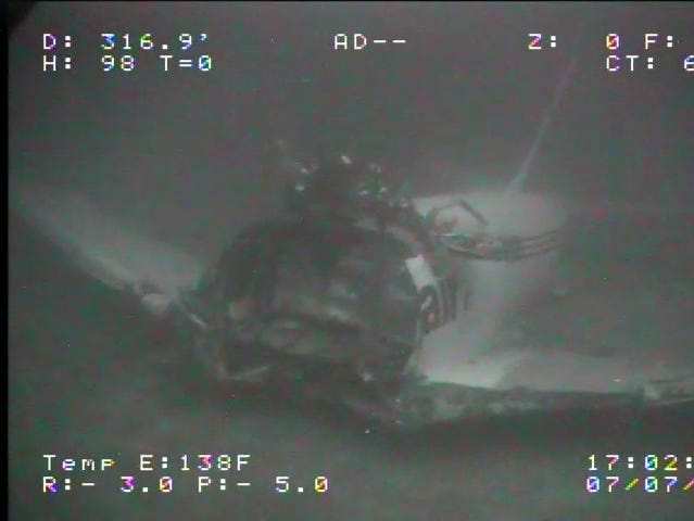 Eerie photos show the undersea wreck of a Boeing cargo plane that crashed off the coast of Hawaii