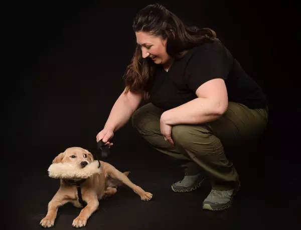 I'm an army veteran whose puppy eased my PTSD. Now I own a dog-training school - here's what my job is like.