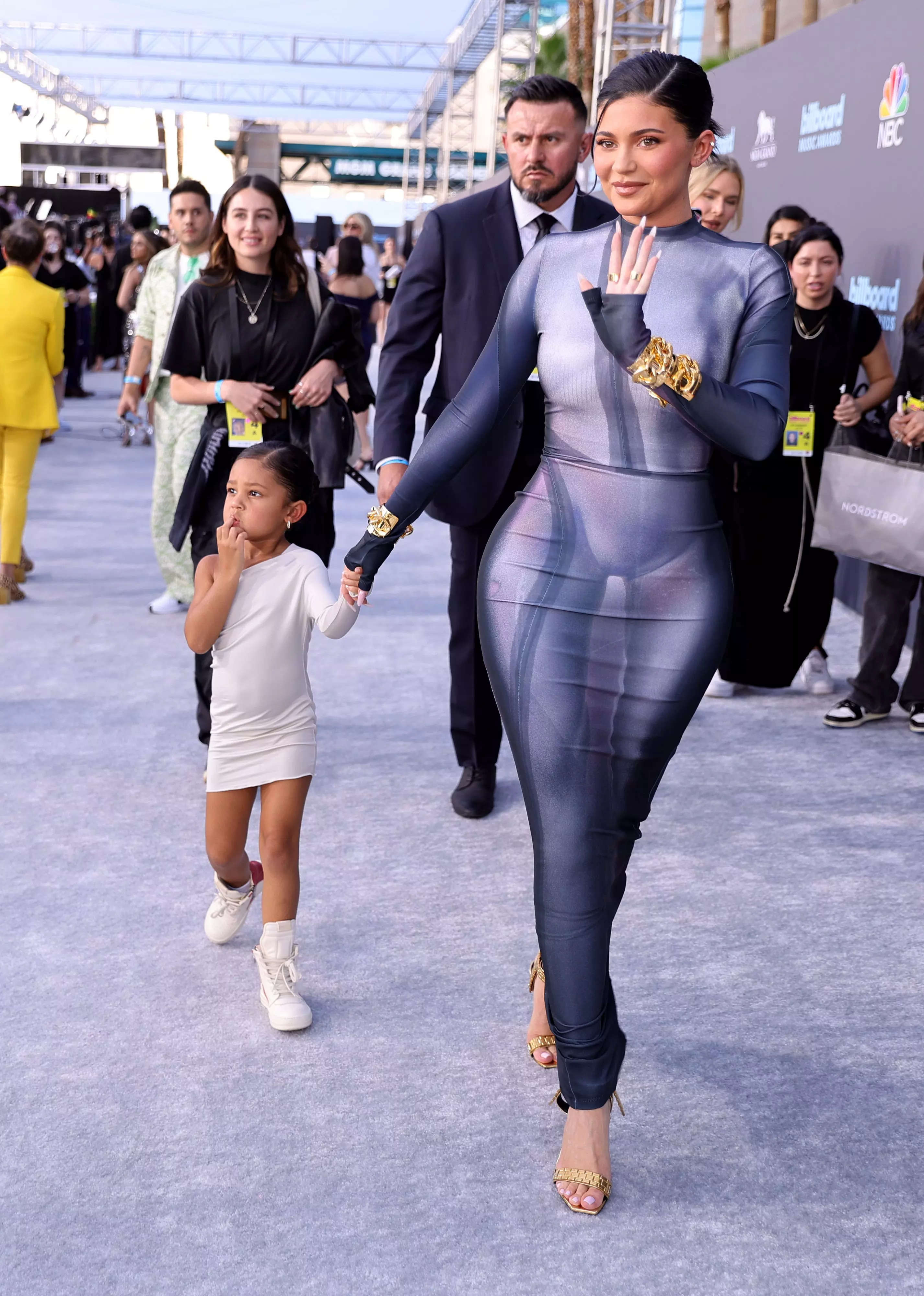 Kylie Jenner, Travis Scott, and their daughter Stormi returned to the red carpet as a family at the Billboard Music Awards