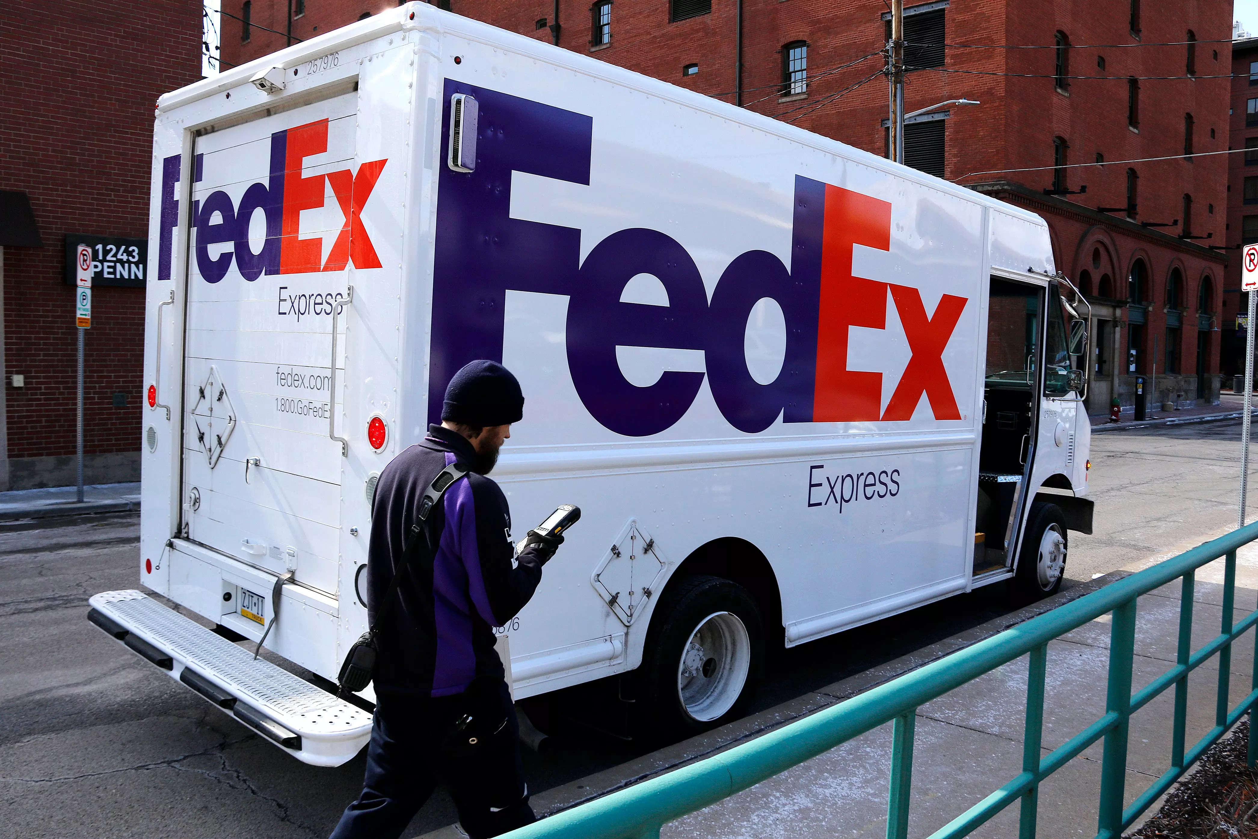 FedEx shares fall more than 19% after the shipping giant cut its earnings outlook and warned of a worsening global economy
