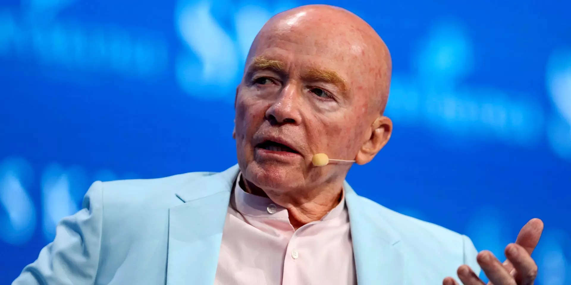 Billionaire investor Mark Mobius says stocks could stay up amid Fed rate hike and possible recession