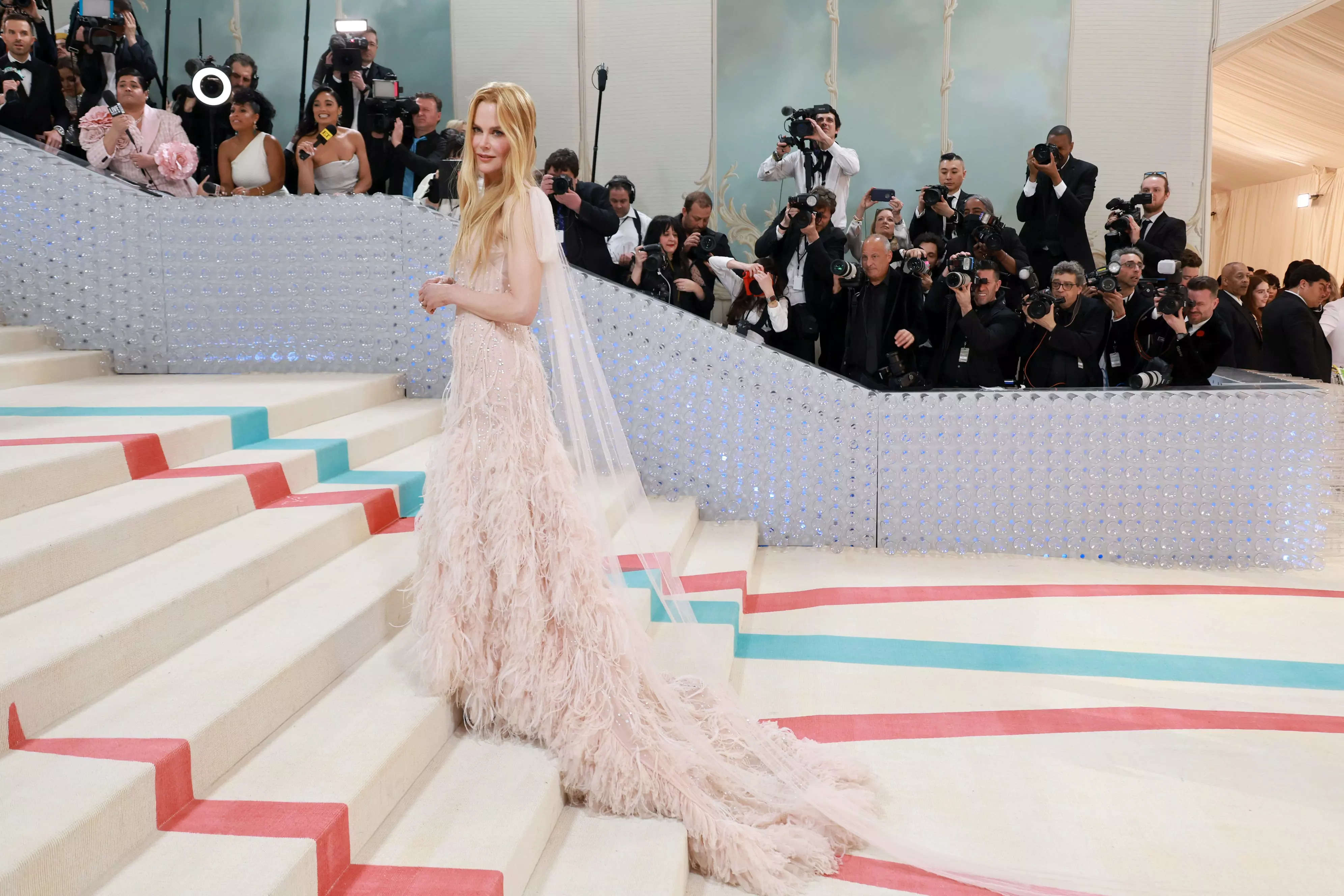 Nicole Kidman wore the iconic dress Karl Lagerfeld designed for her famous  2004 Chanel No. 5 commercial to the Met Gala