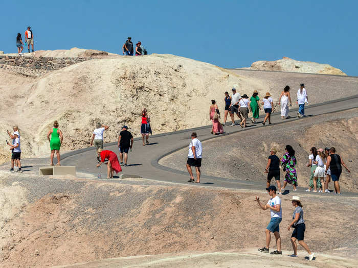 In July, tourists were photographed visiting Death Valley in California amid a blistering heat wave that saw temperatures reach 130 degrees Fahrenheit.