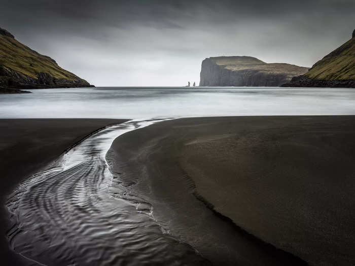 Ciaran Willmore's image of water flowing through the Faroe Islands won first place in Seascapes.