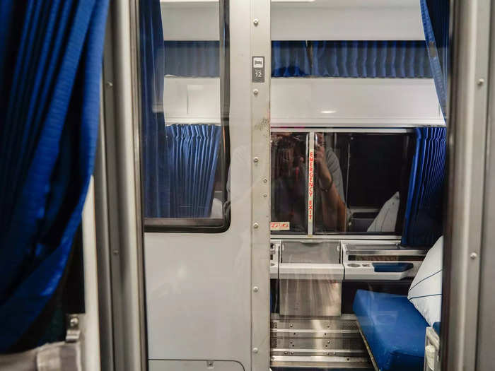 On my way to Miami, I booked a roomette, an approximately 20-square-foot private cabin that cost about $500 and included two beds, a table, two chairs, and a toilet.
