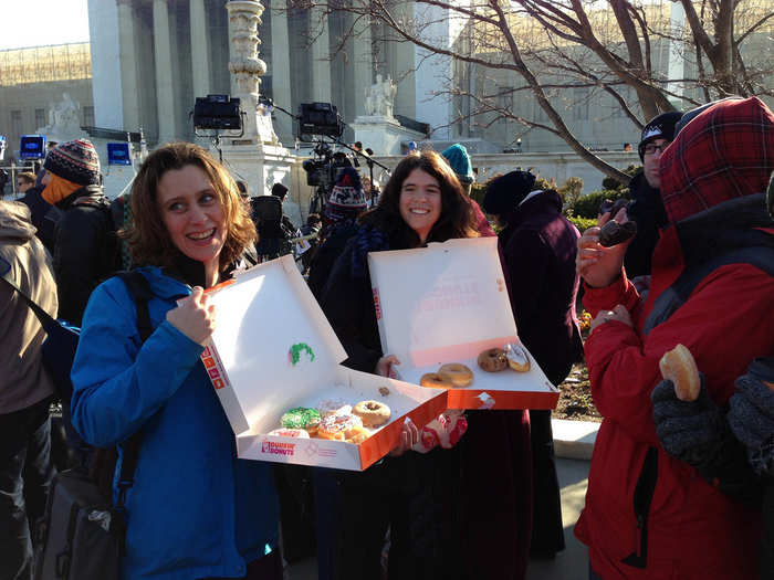 Marriage equality advocates passed out donuts to those waiting in line to enter SCOTUS.