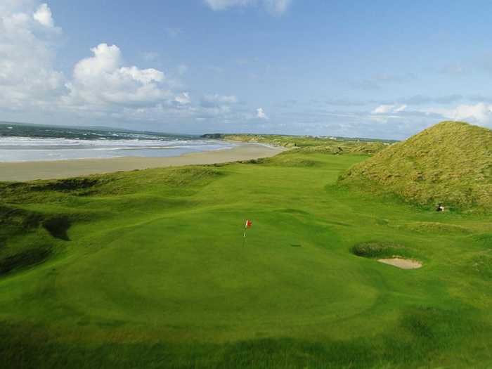 Located on the west coast of Ireland, The Old Course at Ballybunion is naturally beautiful with grassy dunes set alongside the ocean. Nearly every hole here is excellent.