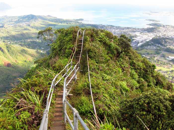 Hike the Haiku Stairs in Oahu, Hawaii — also known as "The Stairway to Heaven" — a steep trail with a wooden ladder spiked into the side of a cliff. Technically it's not open for public use, but people still climb it, and rave about the views from the top.
