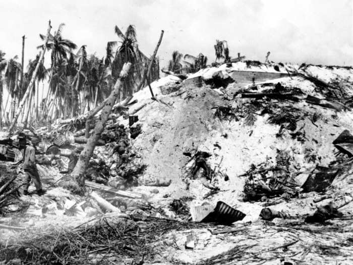 Dead Japanese soldiers lay scattered around a blasted Japanese pillbox at Tarawa Island in the South Pacific on November 11, 1943 during World War II.  A bloody battle ensued after the U.S. Marines invaded the Japanese occupied atoll. This photo by Frank Filan won the Pulitzer Prize in 1944.