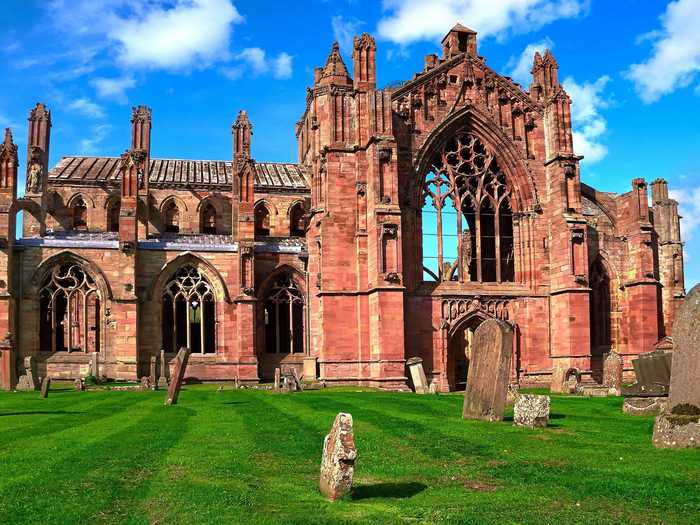 Melrose Abbey is one of the oldest abbeys in Scotland. Today you can explore the ruins of the Cistercian Abbey, which was damaged in the 1500s.