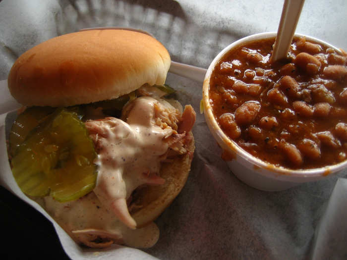 ALABAMA: A chicken sandwich topped with Alabama's specialty white barbecue sauce. The delicious sauce is creamy and tangy, made with mayonnaise, vinegar, salt, and ground black pepper.