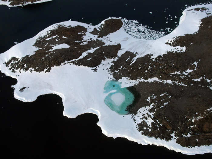 For many people, the first thing that springs to mind when they hear the phrase "global warming" is melting polar ice, like the melted snow forming this turquoise lake on Antarctica's Budd Coast.