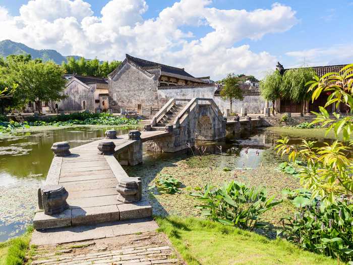 Go back in time and observe the distinct architecture of the 900-year-old village of Hongcun.