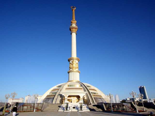Ashgabats-independence-monuments-sums-up-the-style-with-a-blend-of-gold-and-white-surrounded-by-the-statues-of-Turkmenistans-historical-figures-.jpg?417544