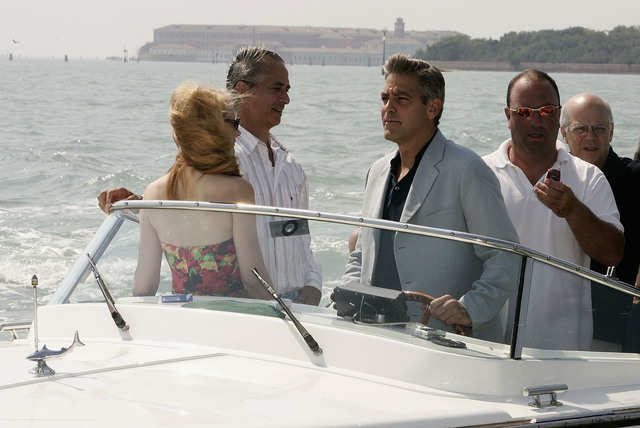 Don't listen to GQ - George Clooney is still incredibly stylish and these 15 photos prove it Clooney-has-a-long-history-of-making-fashionable-arrivals-at-the-venice-film-festival-