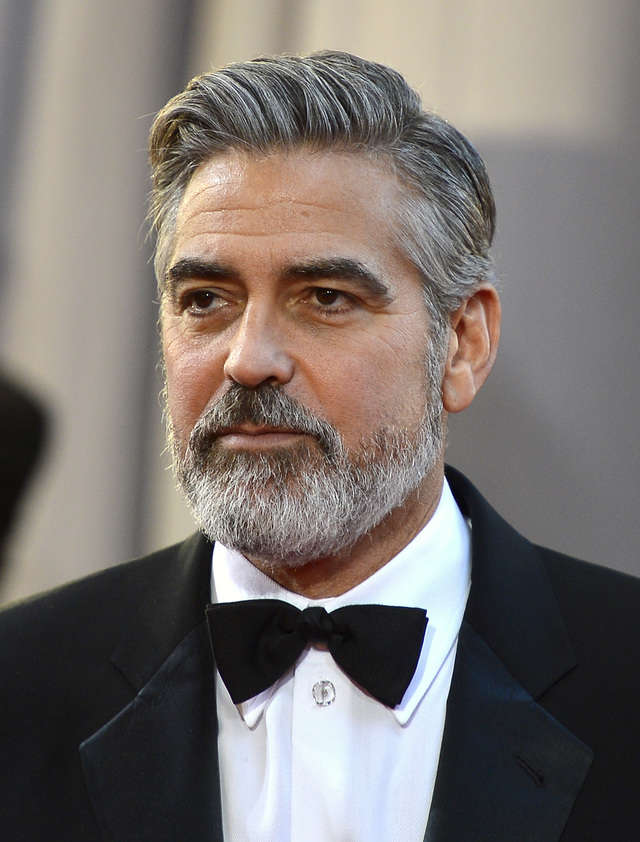 Don't listen to GQ - George Clooney is still incredibly stylish and these 15 photos prove it His-hair-part-is-as-sharp-as-his-suits-